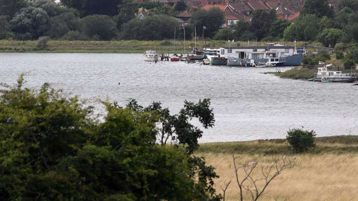 Police seek help to identify mystery body found in river Deben