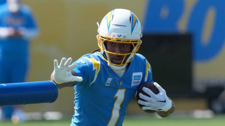 Chargers WR Quentin Johnston leaves on a cart after a scary hit