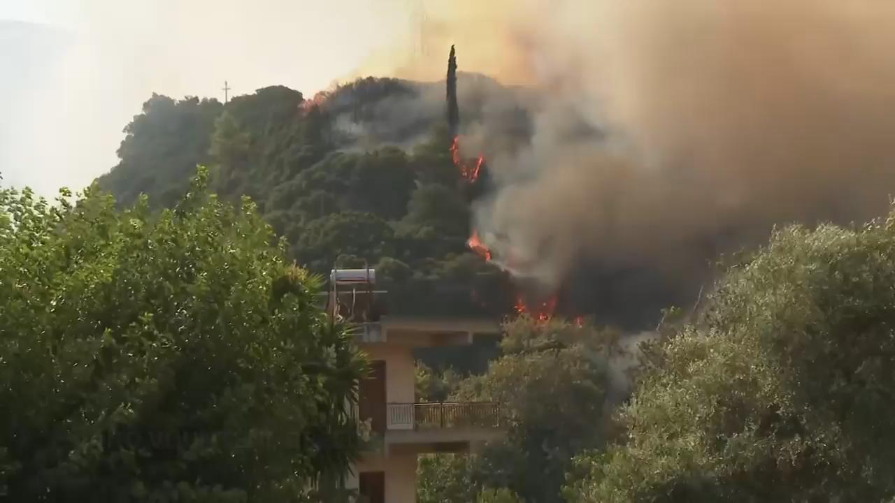Wildfires rage across Europe as heatwave continues