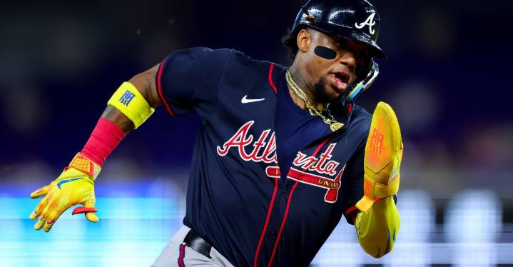 Braves defeat Marlins in game where the benches clear and offense explodes
