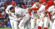The Sports Report: Stumbling Dodgers fall into a first