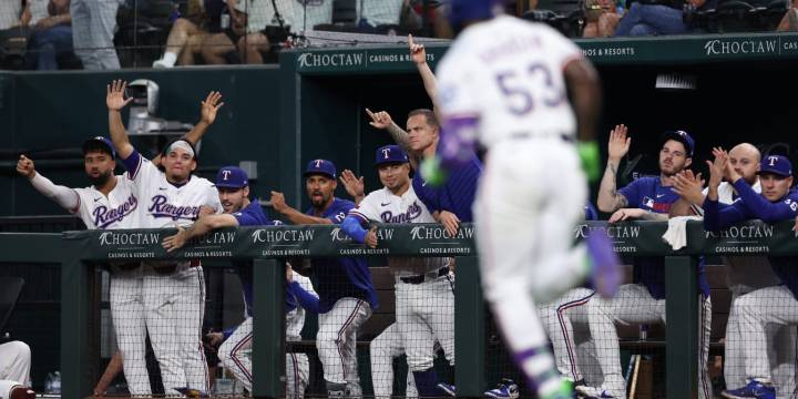 Rangers score 20 runs in rout of Angels