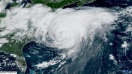Hurricane Erin moves away from the East Coast, but it remains a coastal threat