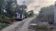 Encuentran a persona calcinada en terreno baldío de García, NL