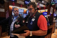 US stocks tap the brakes as Wall Street heads toward the finish of a record