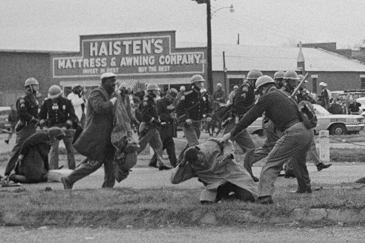 The Voting Rights Act is turning 60. Civil rights marchers recall a hard