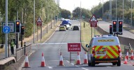 Man and schoolboy killed in mysterious crash after car 'drives off the road'