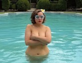 Jennifer Tilly Ditches Swimwear in Wild Pool Pic