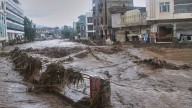 At least 224 dead after flash floods hit India and Pakistan