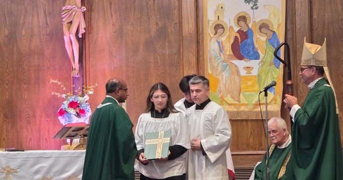 Father Regimon George officially installed as new priest at St. Michael's