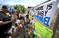 Vigil for missing 7-month-old boy brings out community seeking answers after arrest of his parents