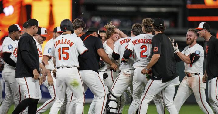 Holliday hits a game-ending double as Orioles cool off Mariners with 4