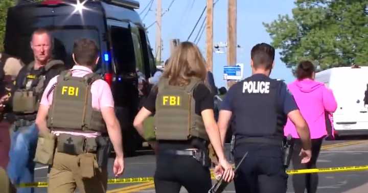 A shooting at a Minneapolis Catholic school kills 2 children, injures 17 people
