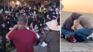 Demonstrators in downtown Los Angeles demand the release of nurse taken into federal custody in San Pedro