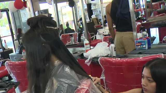 Sacramento students receive free backpacks and haircuts at giveaway event