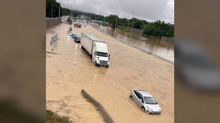 See cars submerged by floodwaters on Tennessee interstate