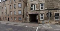 Edinburgh 'gang war' sees private hire company 'firebombed' as police swoop