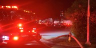 Crews respond to fire at Lexington car dealership building