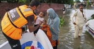 Flash floods leave 32 dead in Indian-controlled Kashmir as over 150,000 are displaced in Pakistan