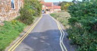 Wonky yellow lines in Norfolk village lead locals to say workers 'must have been drunk'