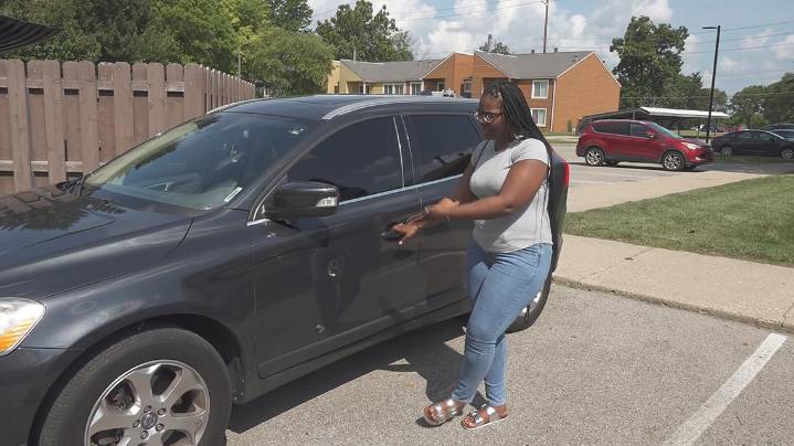 Indianapolis woman says two men threw racial slurs at her and her kids, used a tool to put hole in her car door