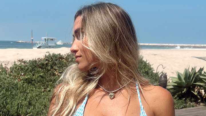 World's sexiest volleyball star Kayla Simmons has fans begging 'marry me' as she wears tiny bikini to 'lunch date'