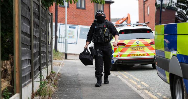 'You just never know, do you?' Neighbours' shock as police raid suspected spice lab and seize 'blank firing weapon'