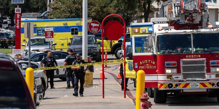 Police say 3 dead in shooting at a Target store and a suspect has been detained