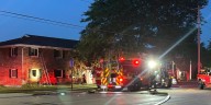 Fire at an apartment complex leaves three residents displaced and one firefighter in the hospital