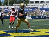 Navy football's offense rolls in rout over VMI in season opener