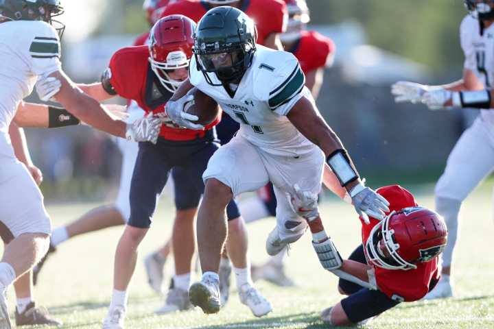 Charlie Yon sacks, punts and tallies 3 TDs in Thompson's crushing season-opening win over May