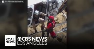 Helicopter crew rescues Long Beach man after he gets trapped behind waterfall