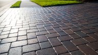 Here's Why You Shouldn't Skip Out On Paver Sealants