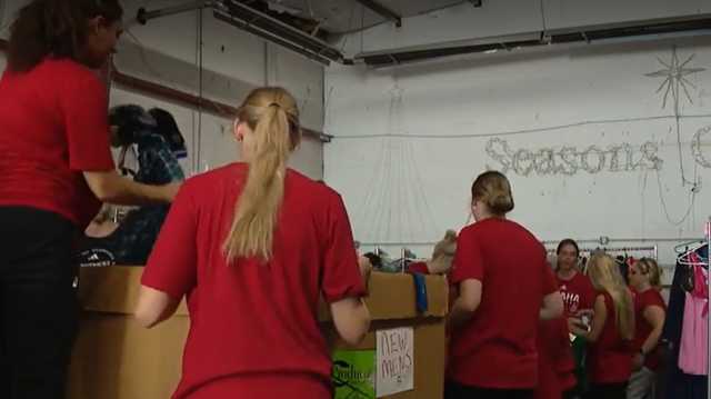 Beloved tradition: UNO volleyball volunteers at Open Door Mission