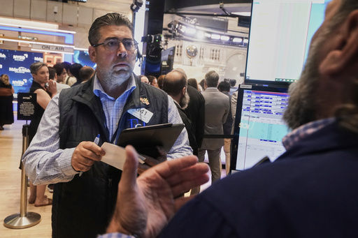 Asian shares are mixed in quiet trading as traders await cues from the Fed