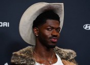 Lil Nas X charged with attacking police officers as he walked naked on LA street