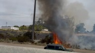 Brush fire starts in between two interstates in Murray