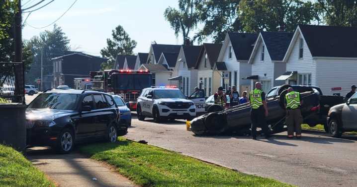 Vehicle overturns, sends other vehicle into front porch of house in Evansville crash