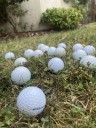 Locals baffled by dozens of golf balls dumped in their gardens