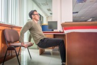 Can’t leave your desk? A personal trainer recommends these three chair exercises to build strength during your workday