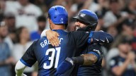 Tigers rally with seven straight runs, down Royals in opener