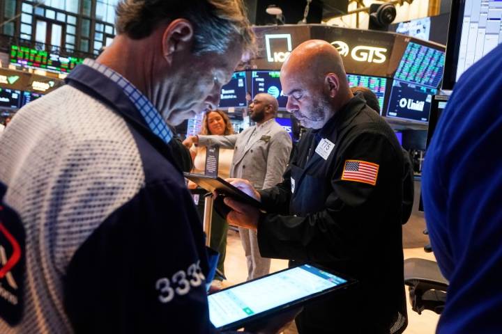 Wall Street finishes its latest winning week with a fade