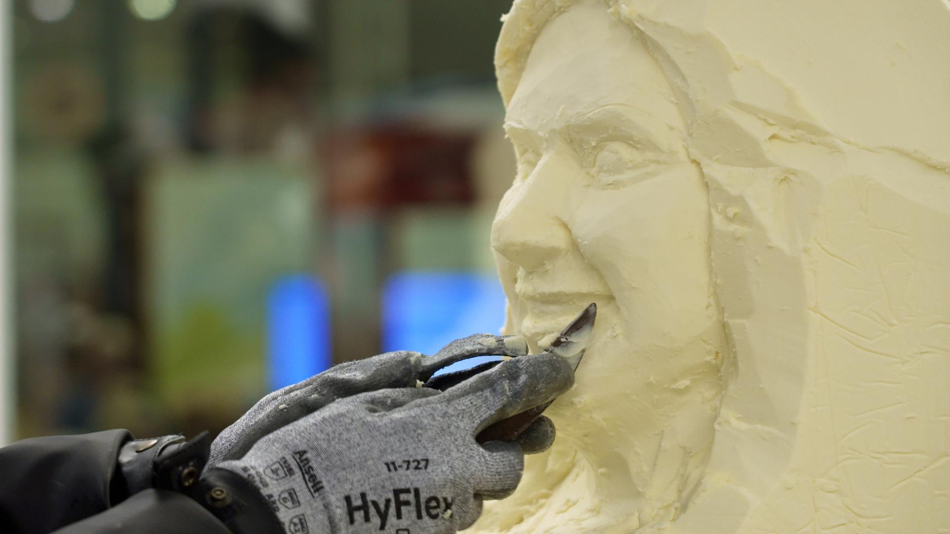 Dairy princess whittled from massive butter block in Minnesota State Fair tradition