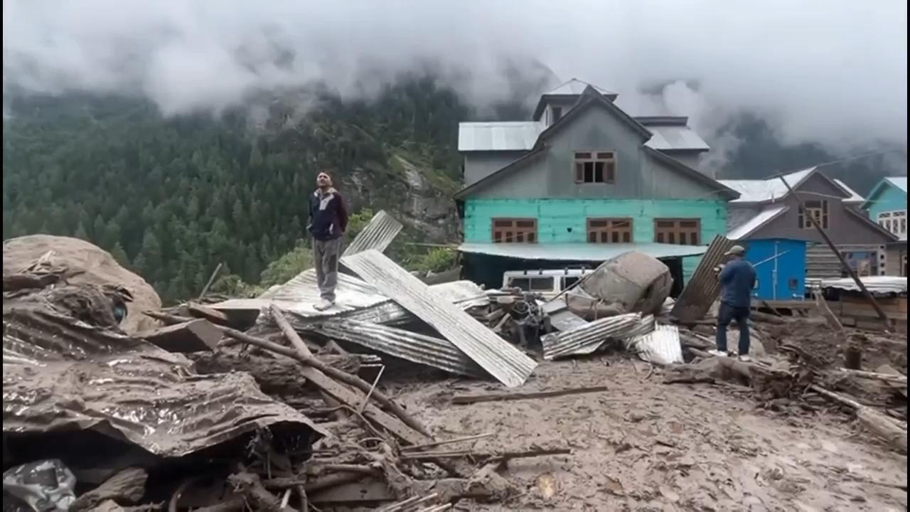 Torrential rains trigger flash floods in India controlled Kashmir, killing at least 56 and leaving scores missing