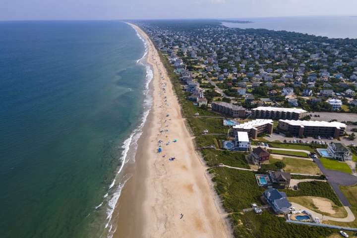 Hurricane Erin's massive waves threaten to isolate North Carolina's Outer Banks