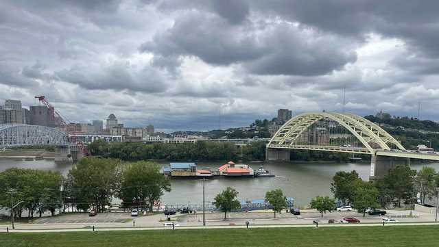 Hooters restaurant spotted being towed down a river after closing