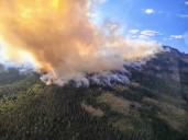 Helicopter ends up in lake as pre-evacuations grow for Derby Fire