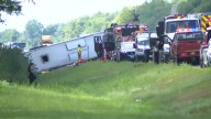 Tour bus rollover kills 5 on interstate highway in western New York