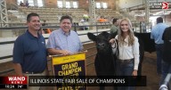 Pritzker buys Grand Champion steer to support Illinois food banks