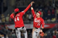 Marte hits 3 doubles and Martinez pitches Reds past Pirates 2